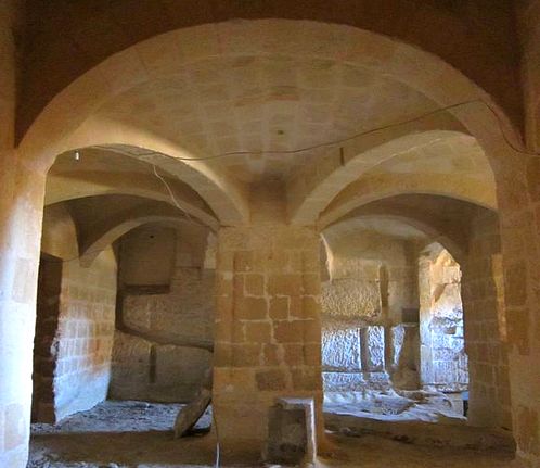 Desecration of a crypt for a non-theatre